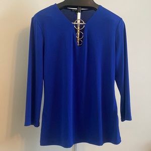INC royal blue blouse with gold accents; size large